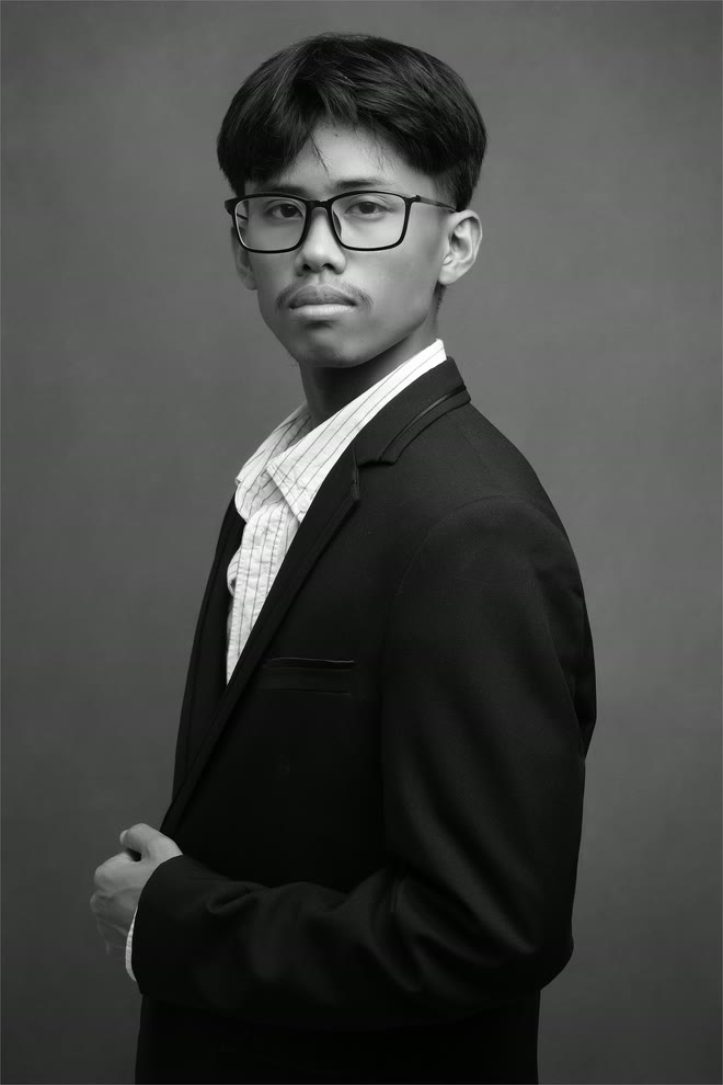 Daniel Rodriguez in a black-and-white studio portrait.